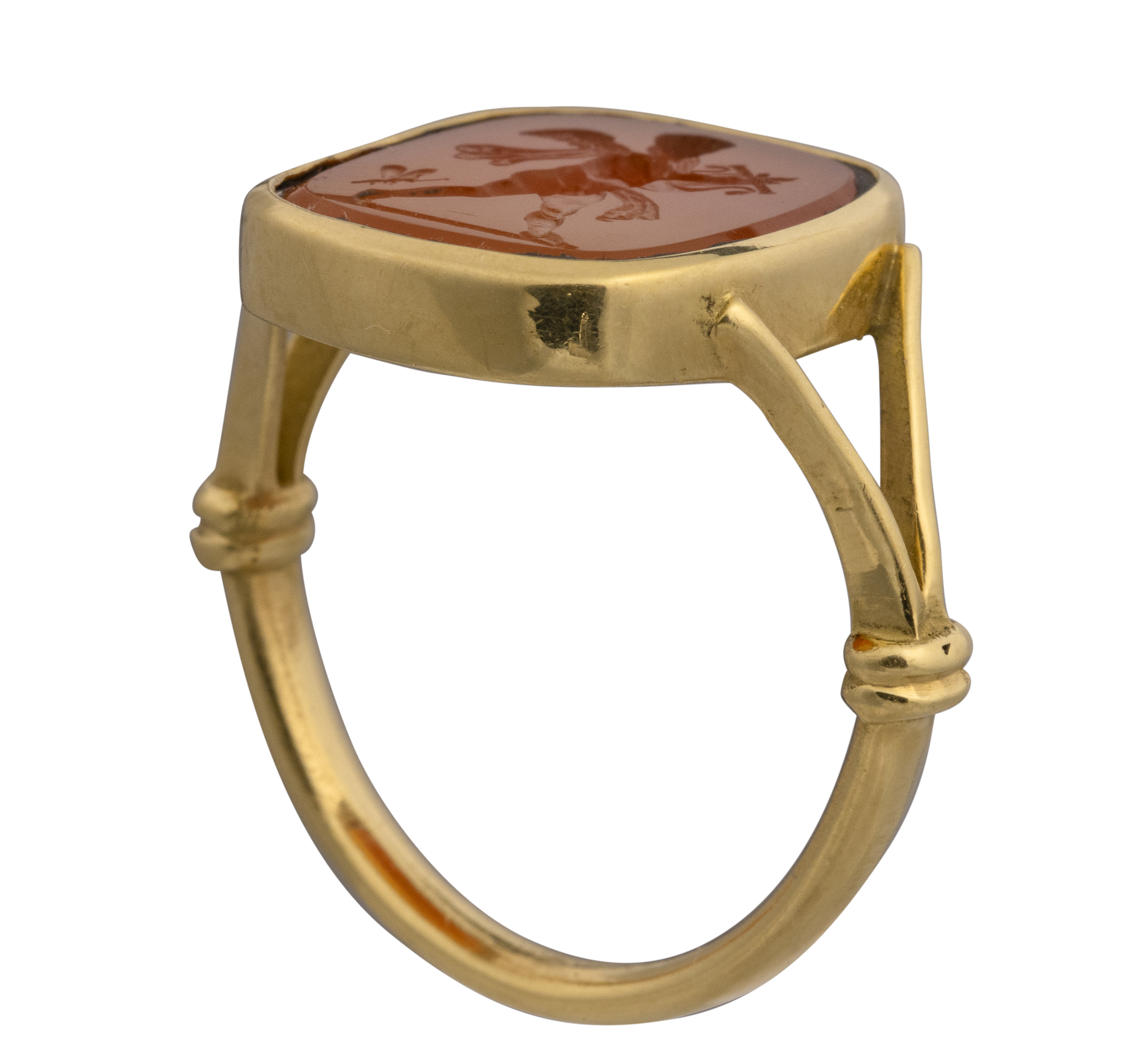 Neoclassical, A gold ring set with a Neoclassical agate intaglio. Cupid playing the lyra with butterfly.  (Early 19th century)