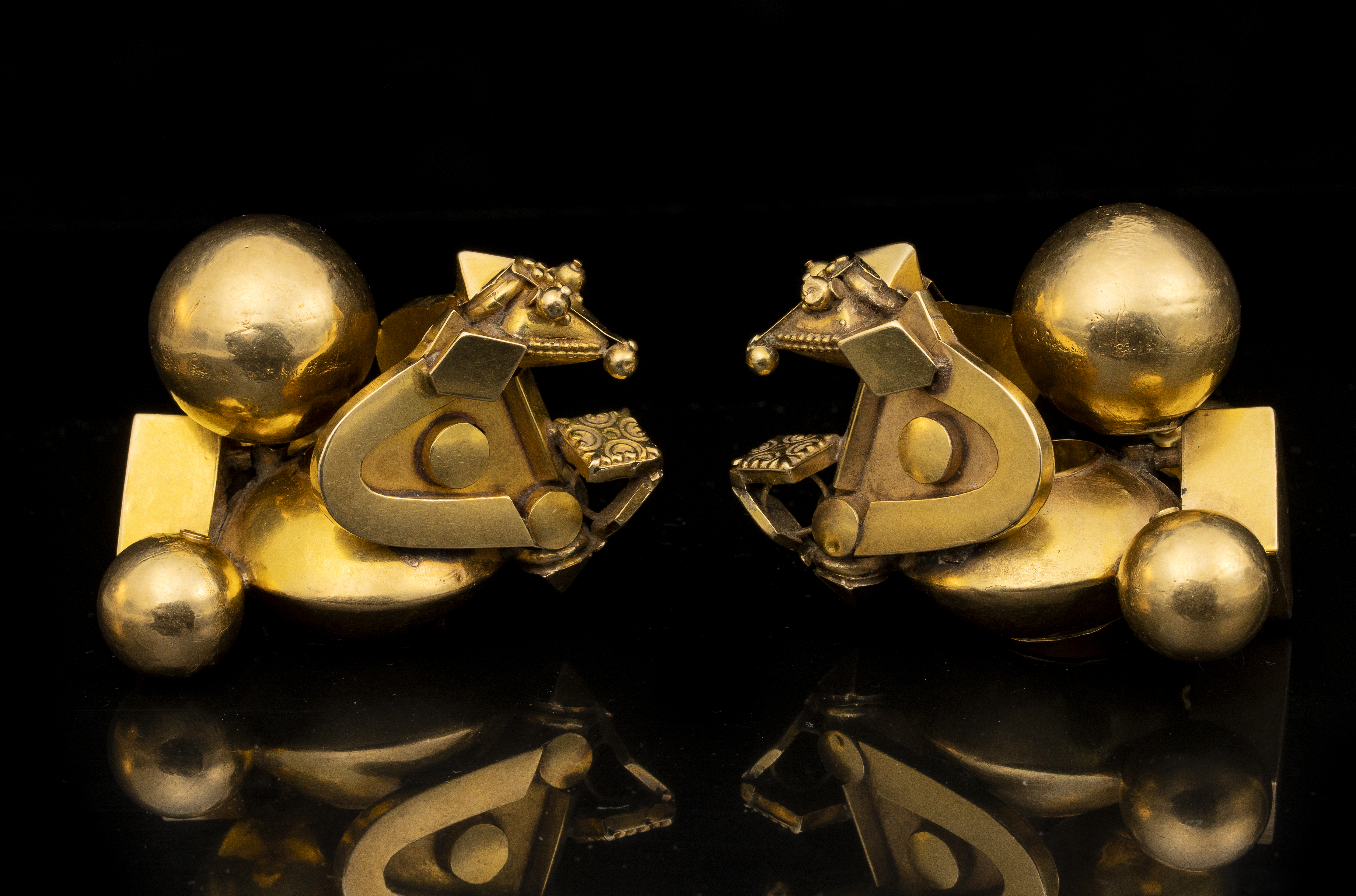 EARLY 20TH CENTURY, A pair of Indian Pambadam gold earrings. (Late 19th century)