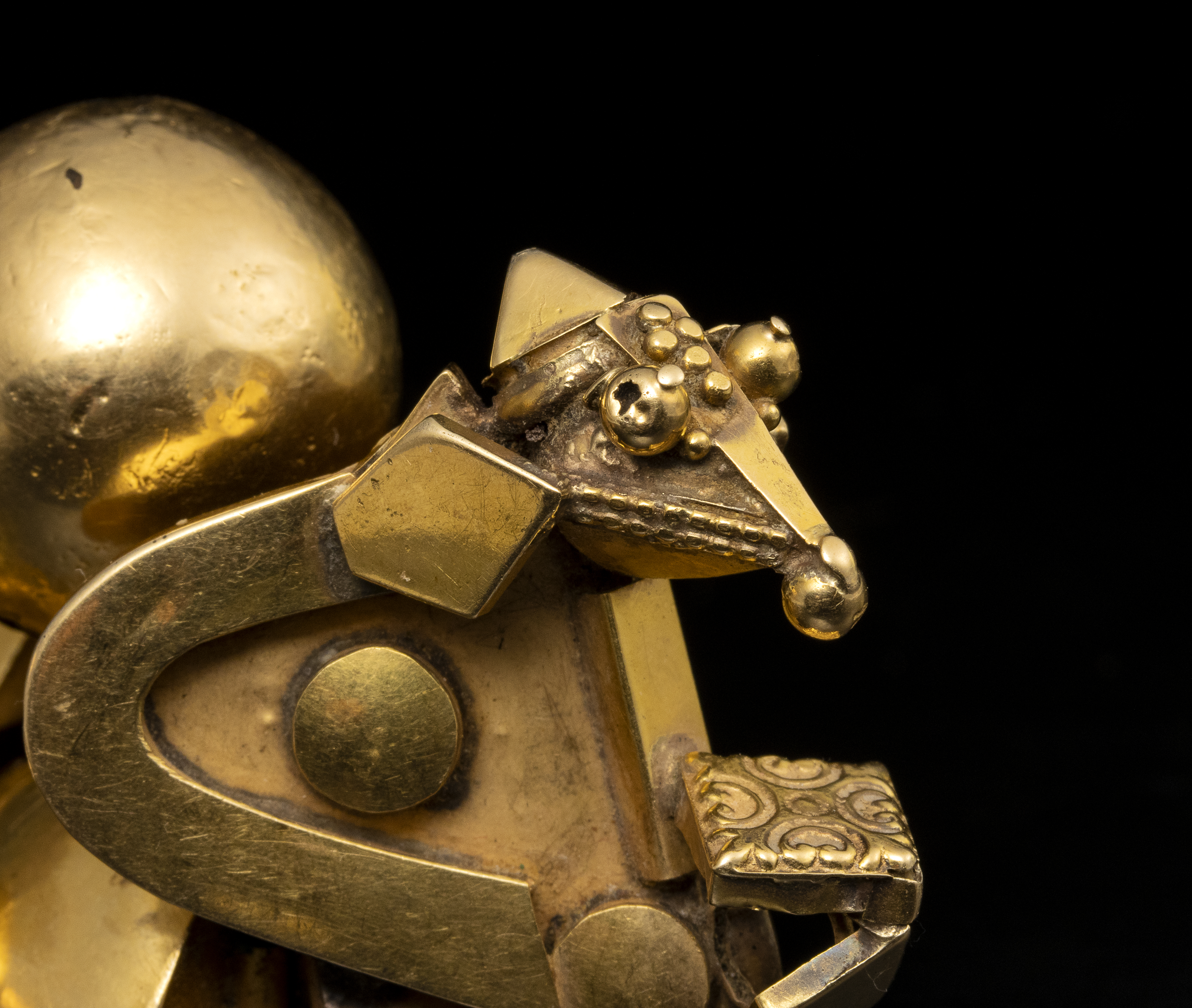 EARLY 20TH CENTURY, A pair of Indian Pambadam gold earrings. (Late 19th century)