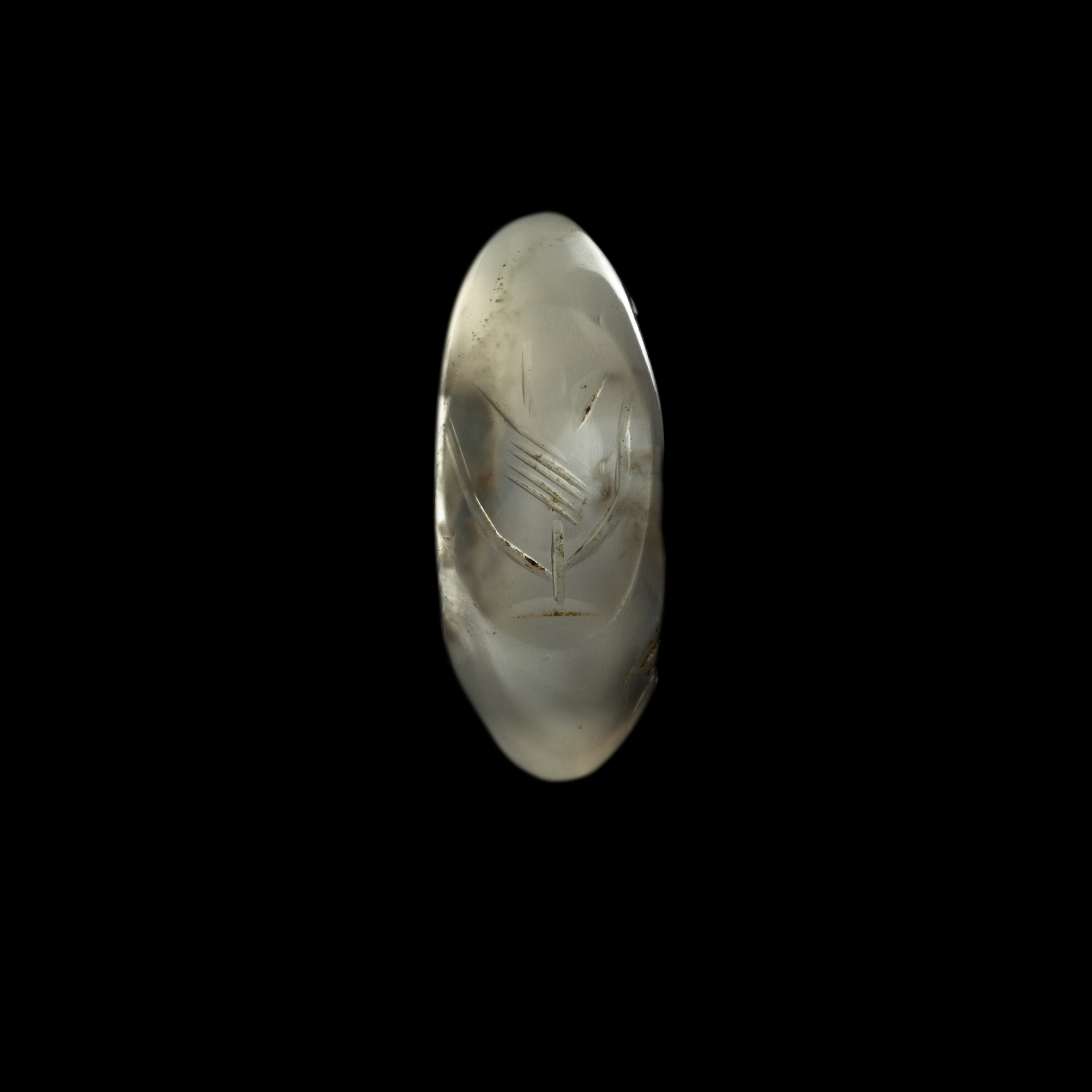 A Sasanian hololithic chalcedony seal ring. Flower.