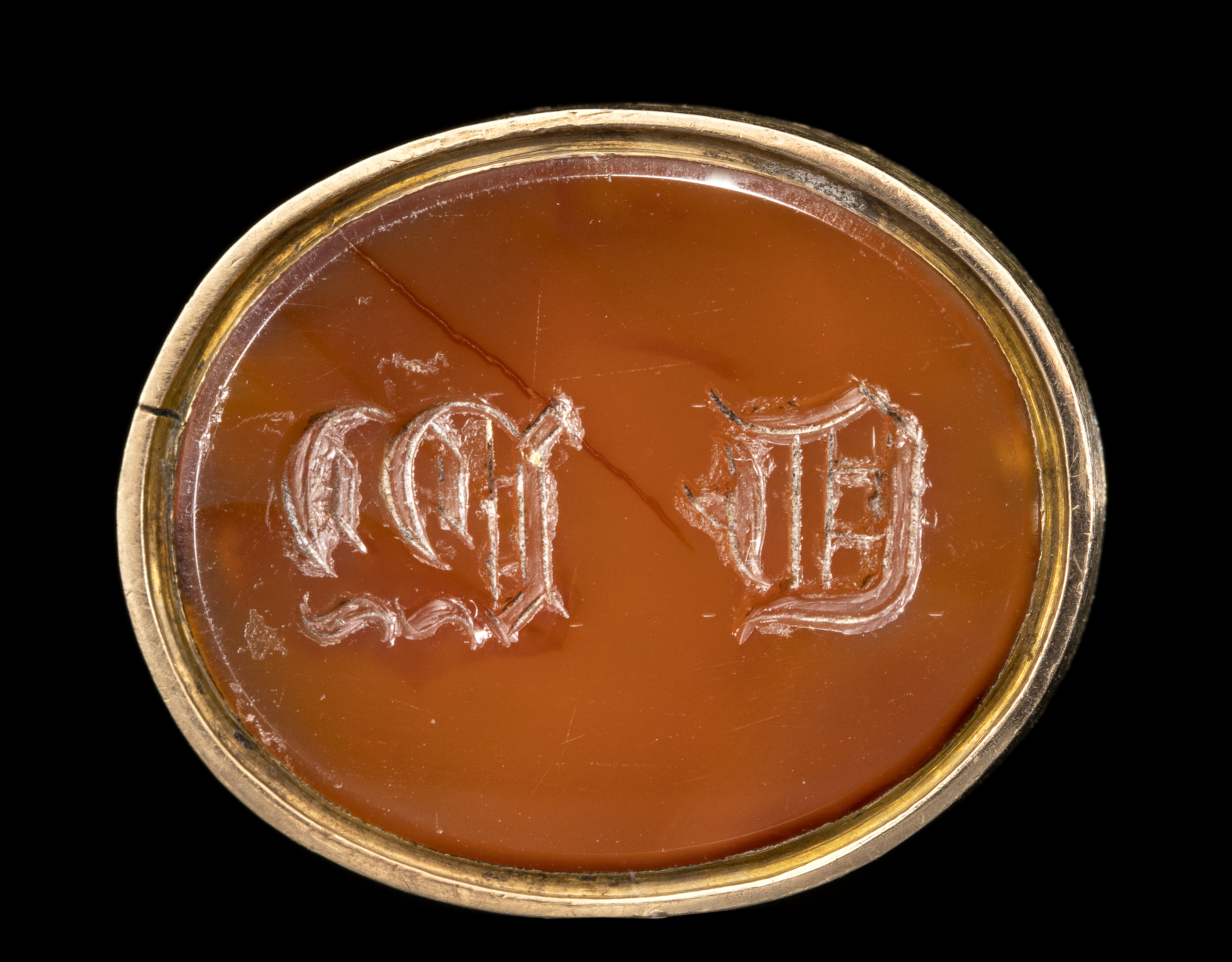 A English Georgian Era gold seal with an engraved carnelian. Allegorical scene of the soul. (18th century)