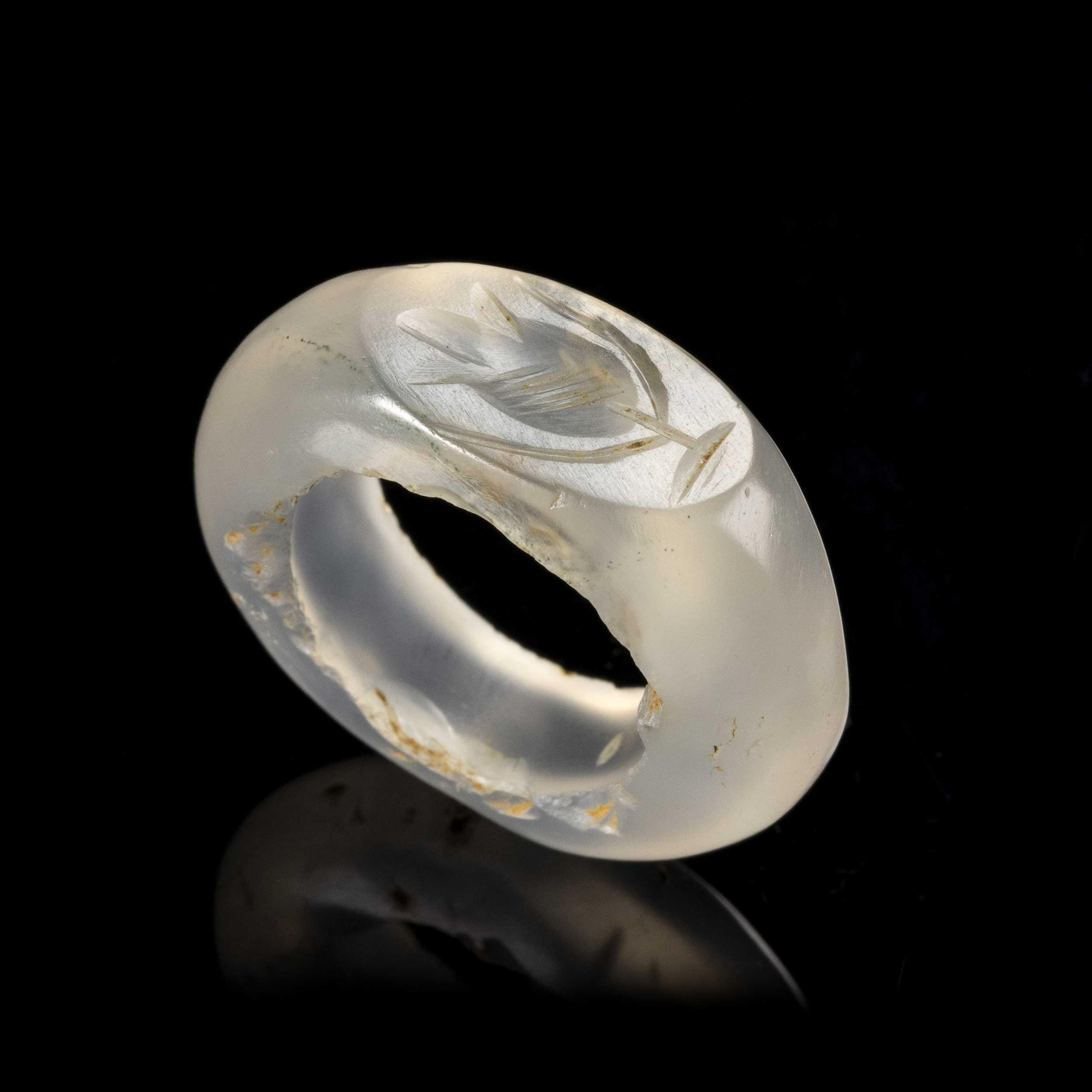 A Sasanian hololithic chalcedony seal ring. Flower.
