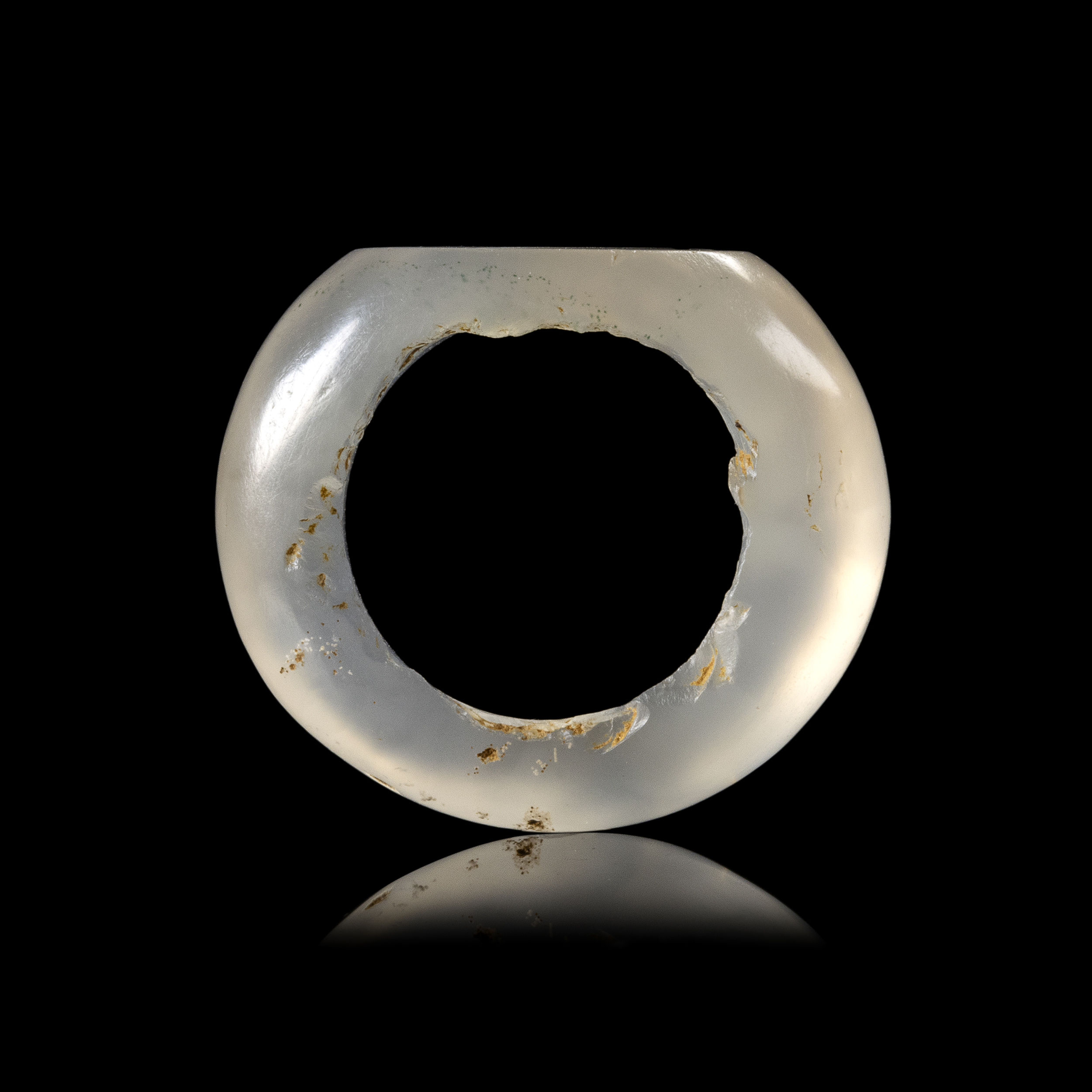 A Sasanian hololithic chalcedony seal ring. Flower.