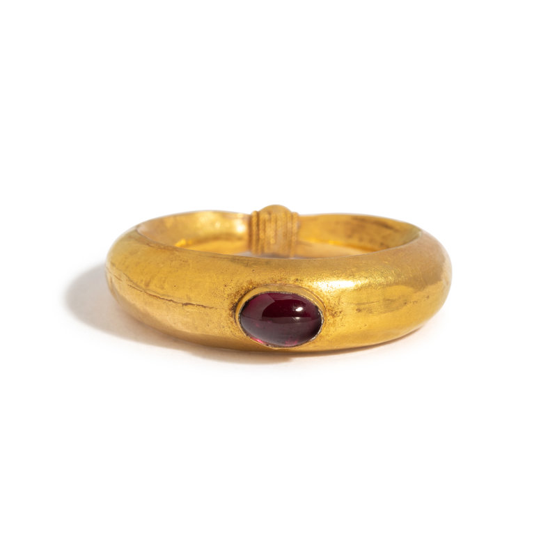 A Roman Gold and Garnet Cabochon ring.