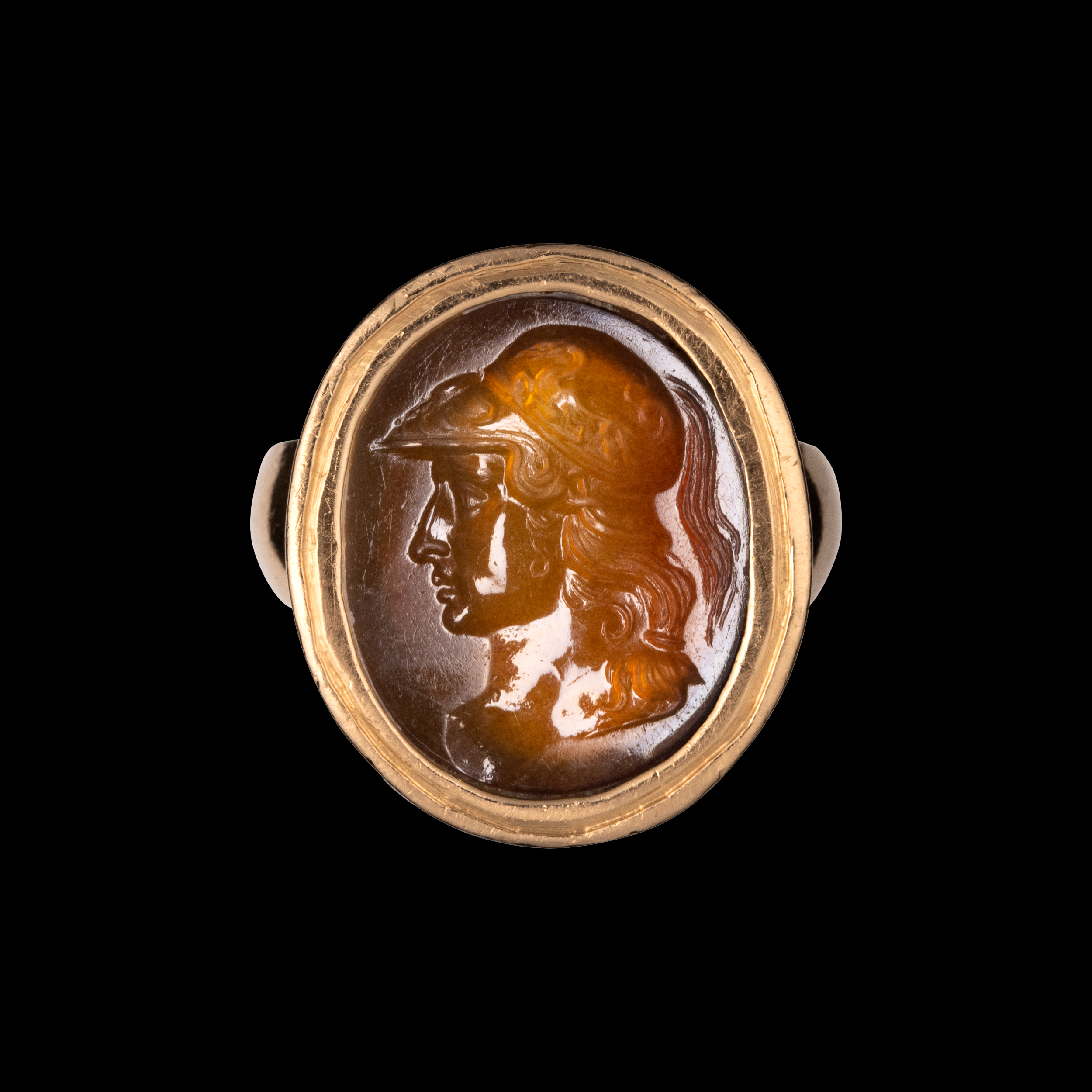 Carlo Costanzi (1705-1781). An Early 18th century sard agate intaglio set in a gold Grand Tour ring. Bust of Alexander the Great.