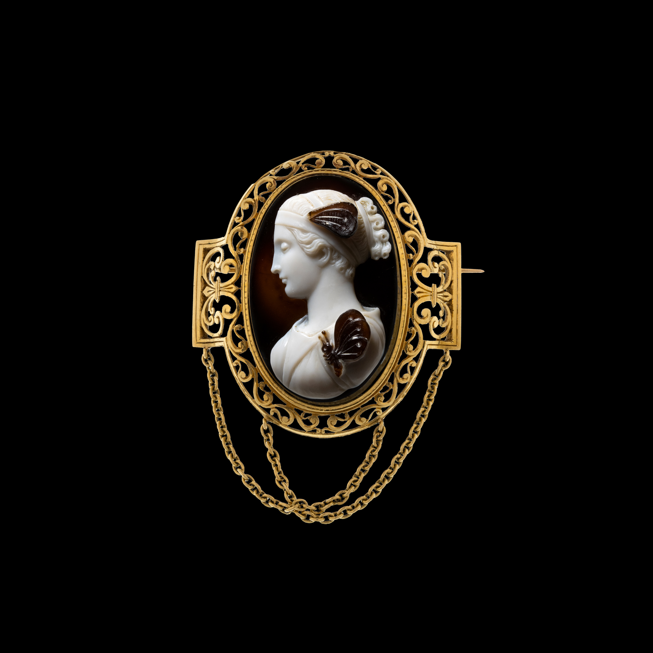 A 19th century gold brooch set with a large agate cameo. Bust of Psyche.