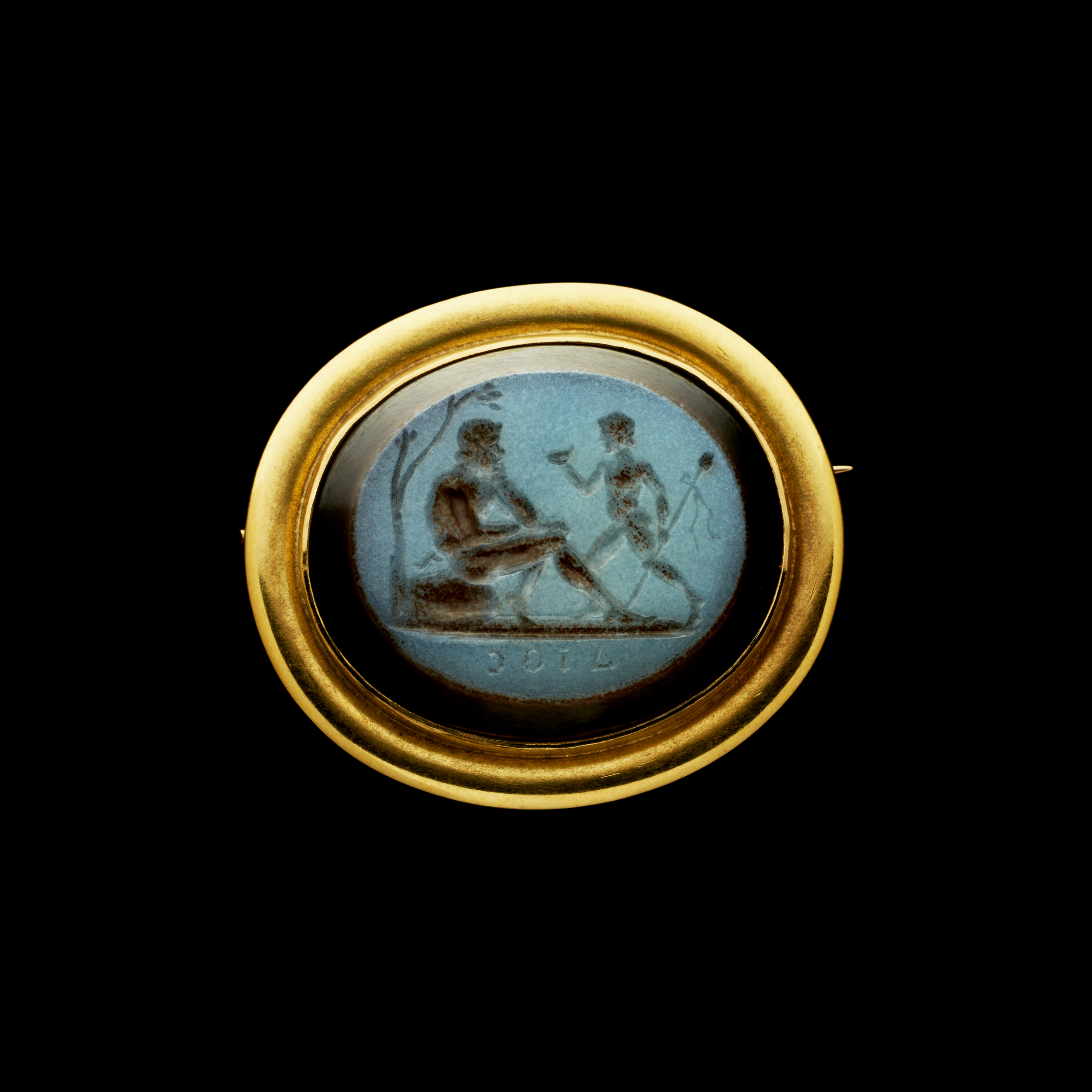 A Gold Brooch set with a Late 18th c.  Nicolo Intaglio — Youth and Satyr