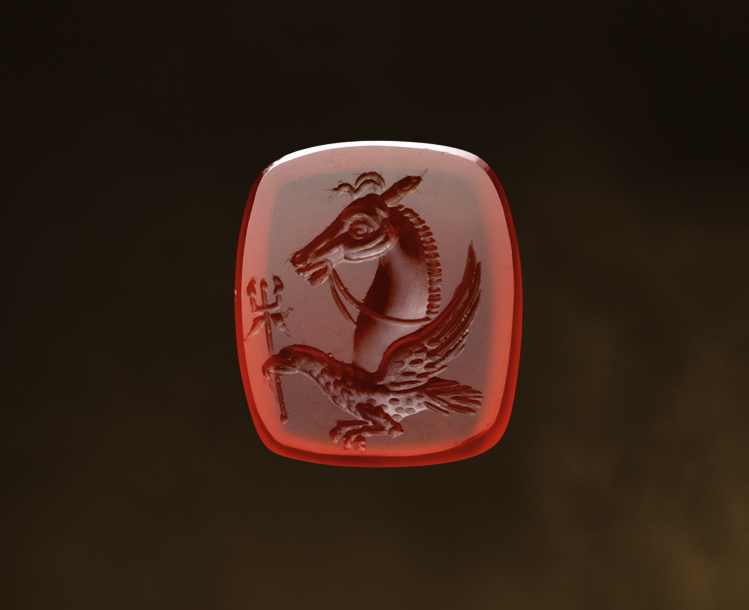 A Victorian carnelian engraved seal. Allegorical figure