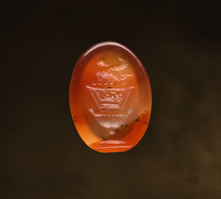 A large Roman agate intaglio. Sphinx on a bell-krater.